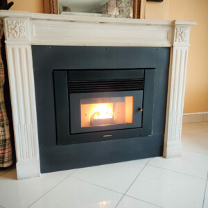 Piano Réalisations : Rénovation d'une cheminée avec un insert à granulés.