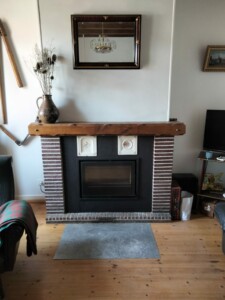 Rocal ARc 80 Réalisations : Rénovation d'une cheminée et installation d'un insert à bois Rocal ARc 80.